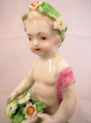 Small Porcelain Figure of a Flower Boy Antique 19th Century.