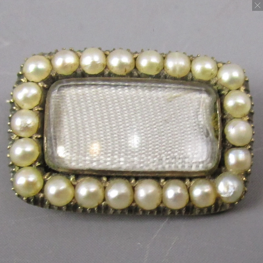 Why are pearls around the edge of morning brooches