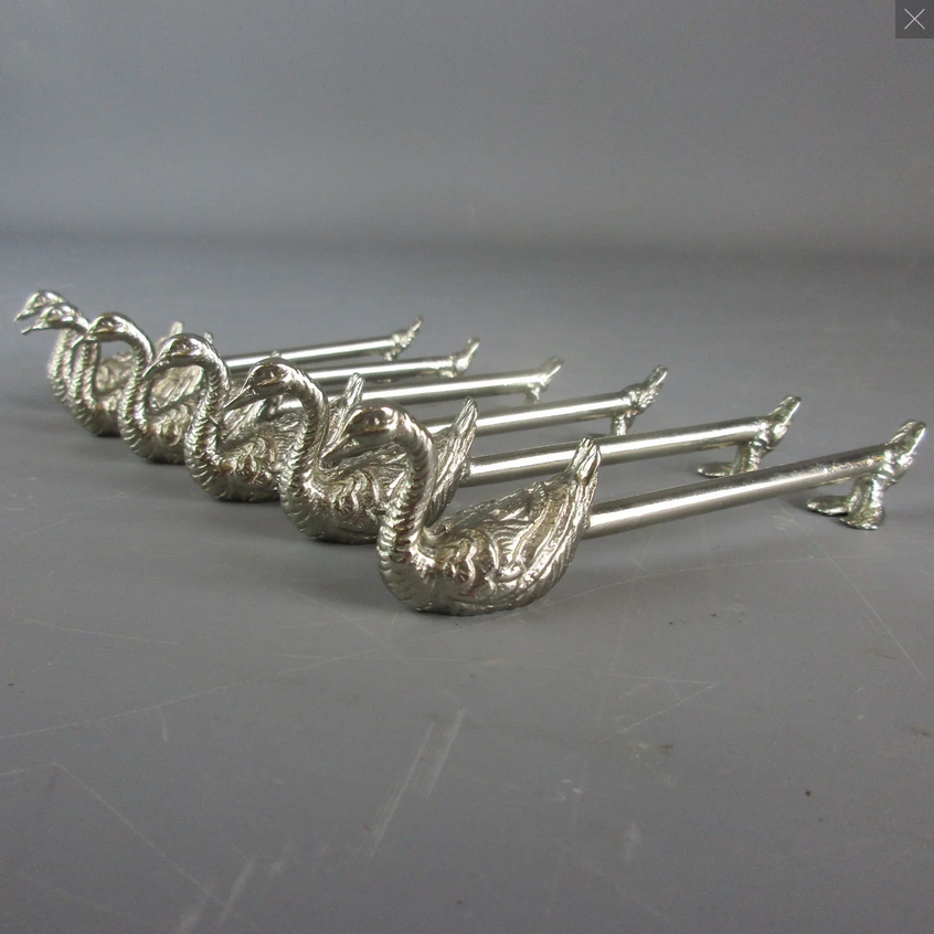 Swan like Top Banana Antiques carries forward