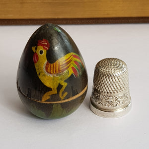 Hand Painted Wooden Egg Shaped Thimble Case With Sterling Silver Thimble Antique circa 1908