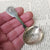 Sterling Silver Shelled Fiddle Pattern Tea Caddy Spoon With Flora Chased Bow Antique Georgian London Circa 1825