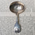 Sterling Silver Shelled Fiddle Pattern Tea Caddy Spoon With Flora Chased Bow Antique Georgian London Circa 1825