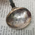 Sterling Silver Shelled Fiddle Pattern Tea Caddy Spoon With Flora Chased Bow Antique Georgian London Circa 1825