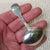 Sterling Silver Shelled Fiddle Pattern Tea Caddy Spoon With Flora Chased Bow Antique Georgian London Circa 1825
