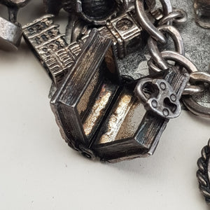 Sterling Silver Curb Link Charm Bracelet With x12 Charms Vintage Birmingham circa 1975