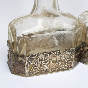 Dutch Sterling Silver Mounted Rare Pair Of Etched And Cut Glass Cherub Stoppered Perfume Bottles Antique Chester Import Circa 1913