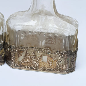 Dutch Sterling Silver Mounted Rare Pair Of Etched And Cut Glass Cherub Stoppered Perfume Bottles Antique Chester Import Circa 1913