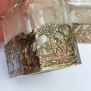 Dutch Sterling Silver Mounted Rare Pair Of Etched And Cut Glass Cherub Stoppered Perfume Bottles Antique Chester Import Circa 1913
