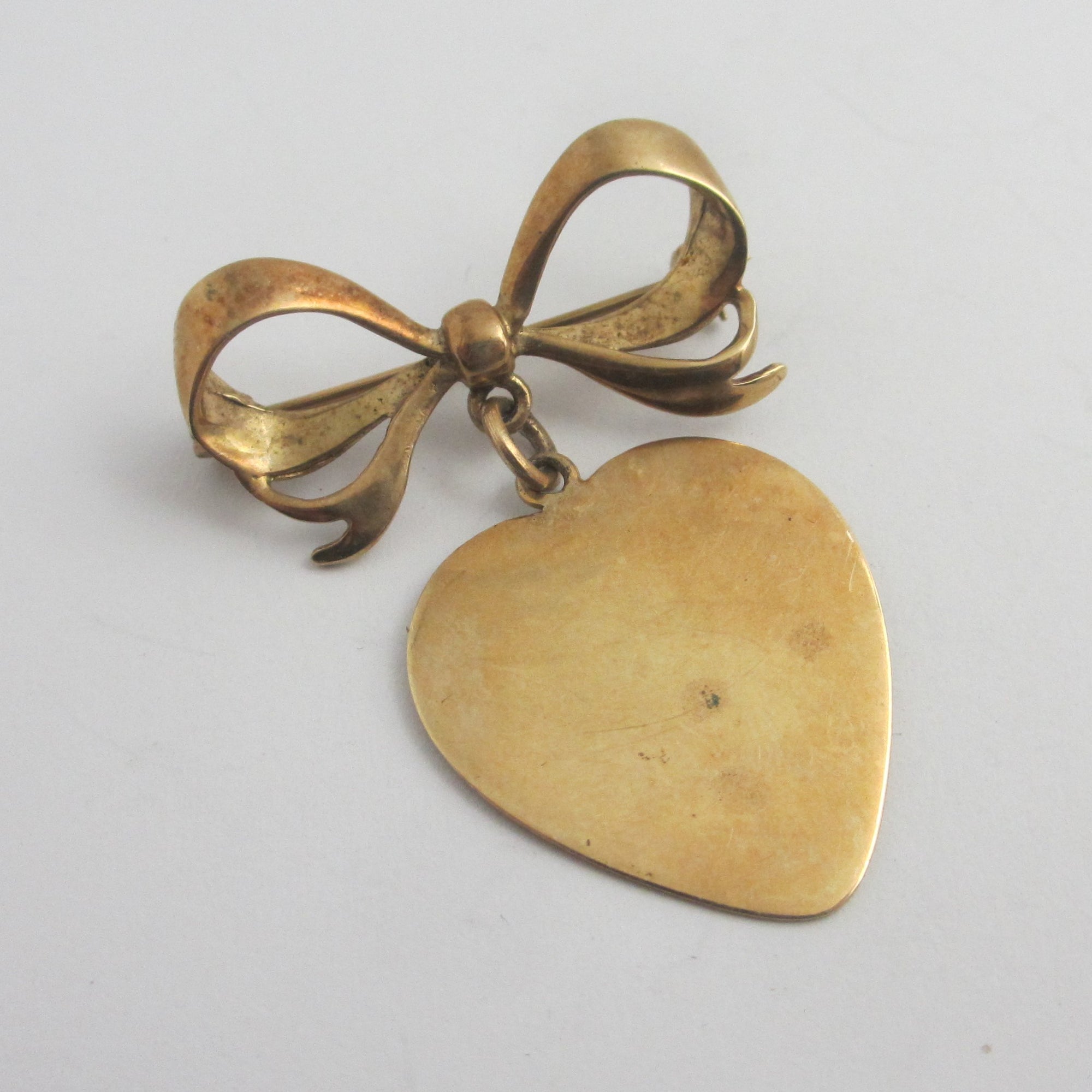 Dangling Heart Pendant below Bow Brooch Pin in 9k Gold Vintage 1966