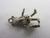 Moving Tourist or Traveller in Sterling Silver Charm or Pendant Vintage c1960