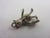 Moving Tourist or Traveller in Sterling Silver Charm or Pendant Vintage c1960