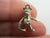 Moving Tourist or Traveller in Sterling Silver Charm or Pendant Vintage c1960